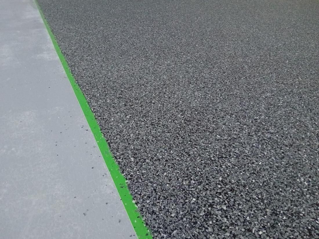 Flake close-up on a shed floor by Epoxy Armour Coatings, Sunshine Coast